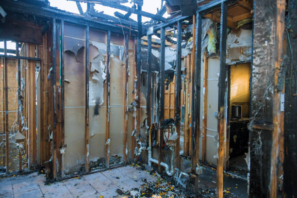 Professional Emergency Fire Cleanup technician working in Summit, MS